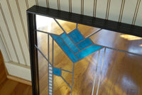 Closeup detail of decorative mirror for console table