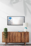 Arts and Crafts mirror "Beatrix 18x36" hangs above a console table in the foyer