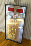 Foyer mirror with red, yellow and white stained glass