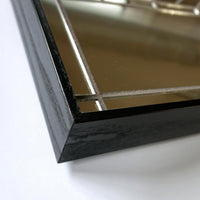 Corner detail of "Francesco 16x46" rectangular Craftsman mirror