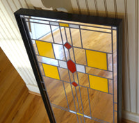 Art Deco mirror with yellow, red and white tiles