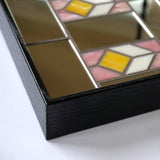 Corner detail of "Marietta 36x24" decorative mosaic mirror
