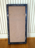 Back of Craftsman mirror in black frame